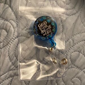 Blue badge reel /holder